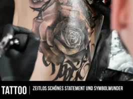 Schwarzes Rosen Tattoo mit Dornen als Symbol für Stärke und Abschied